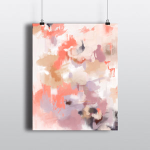 Abstract art print in shades of coral, tan and purple hanging from clips.