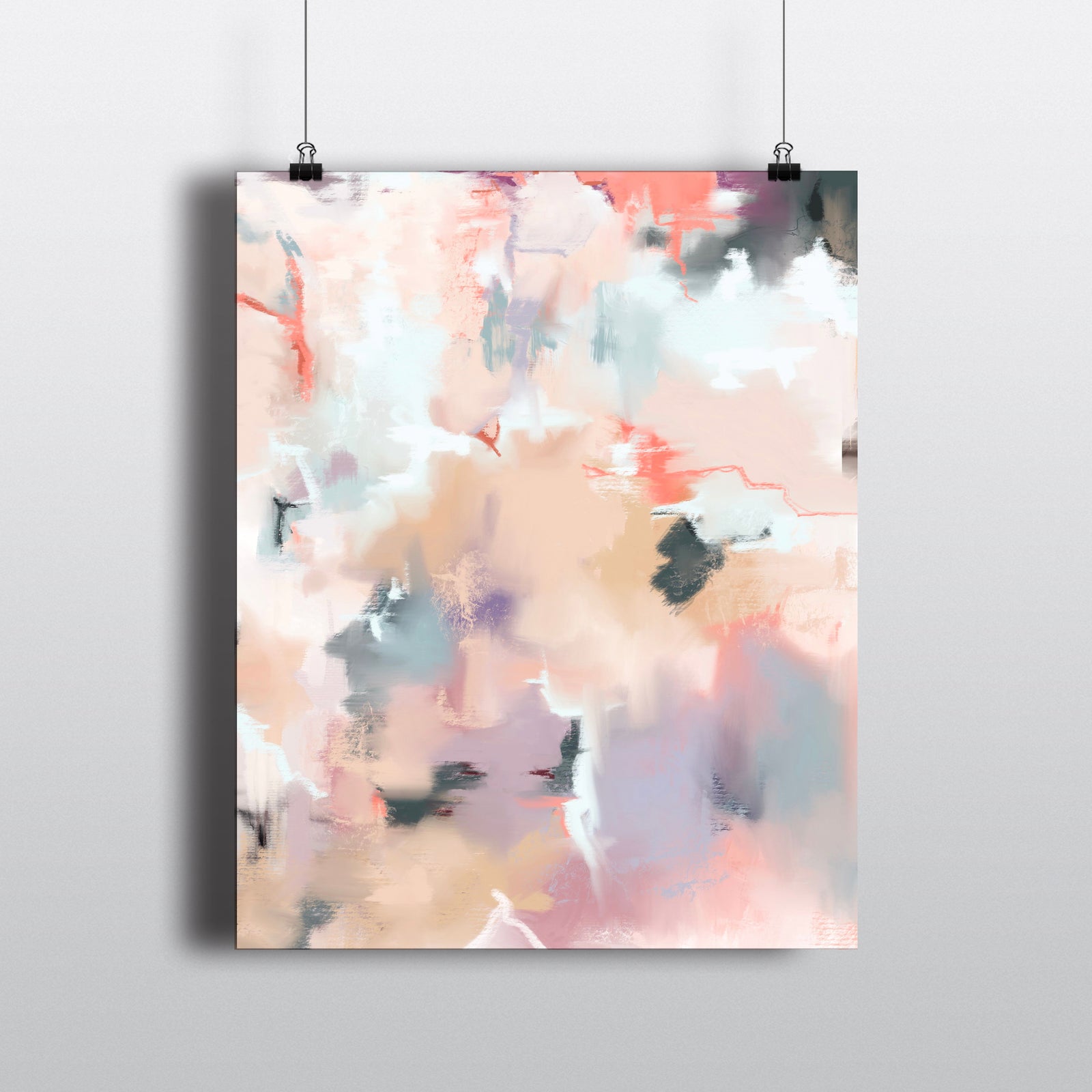 Abstract art print in shades of tan, coral, peach, mauve, ice blue and lilac hanging on clips