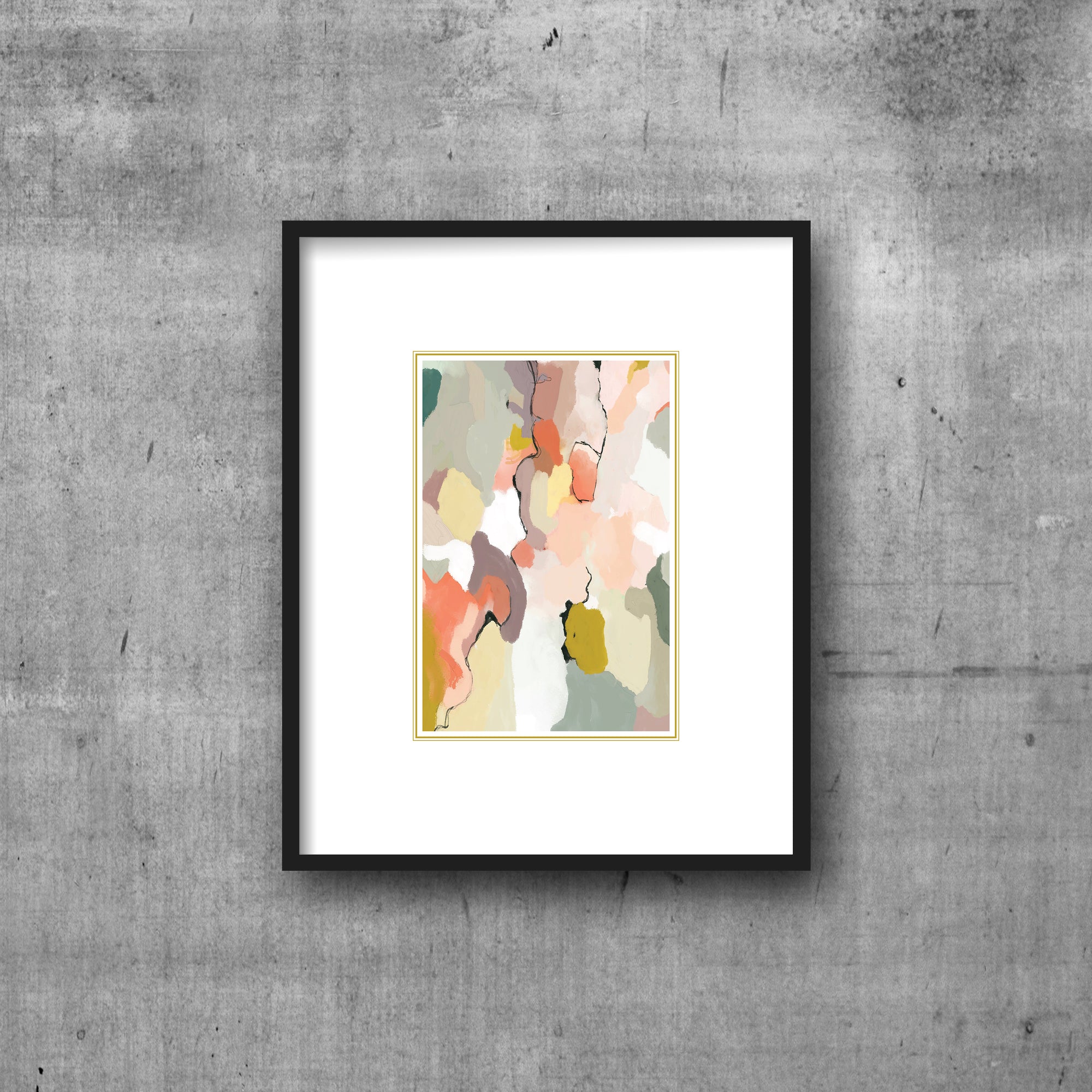 Art print with white border framing coral, sage abstract pattern with gold frame. Hanging by clips.